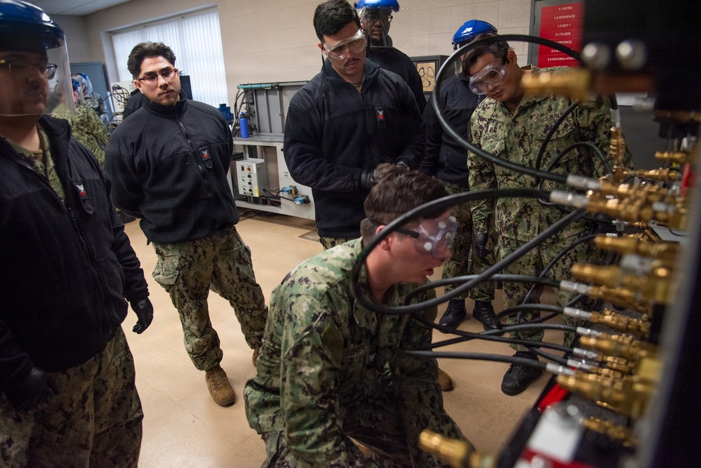 Surface Warfare Engineering Schools Command (SWESC) Great Lakes Instructors Train Next Generation of U.S. Navy Cargo Weapons Elevator Operators