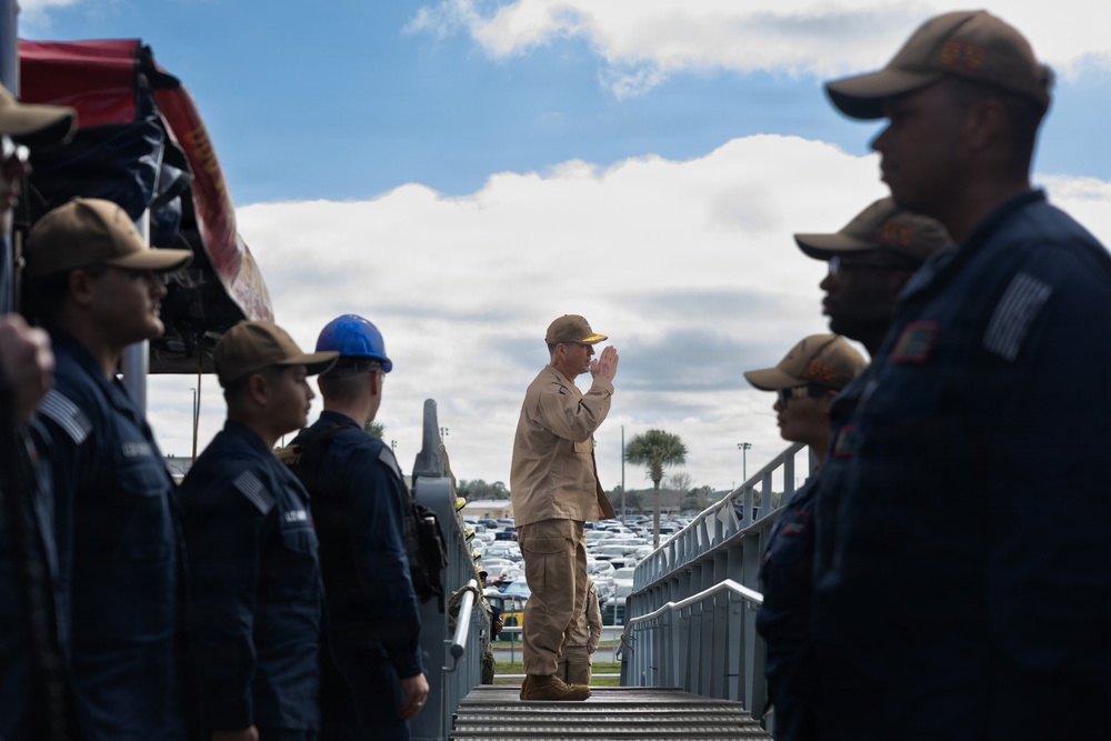 Rear Adm. Forrest Young, Commander, Carrier Strike Group (CSG) 8, Presents Awards to USS Jason Dunham (DDG 109)