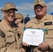 Rear Adm. Forrest Young, Commander, Carrier Strike Group (CSG) 8, Presents Awards to USS Jason Dunham (DDG 109)