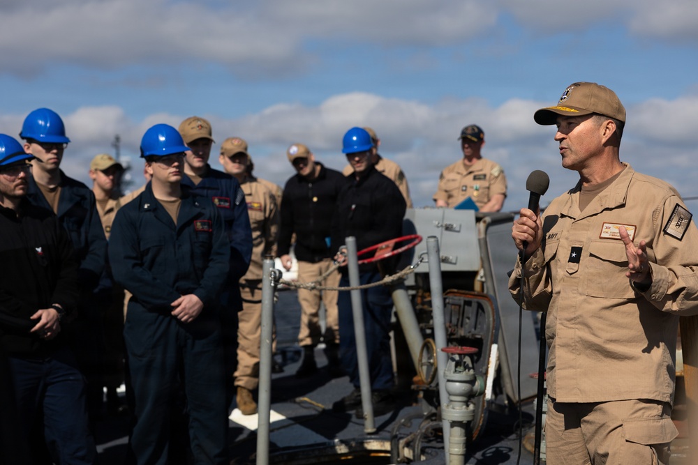 Rear Adm. Forrest Young, Commander, Carrier Strike Group (CSG) 8, Presents Awards to USS Jason Dunham (DDG 109)