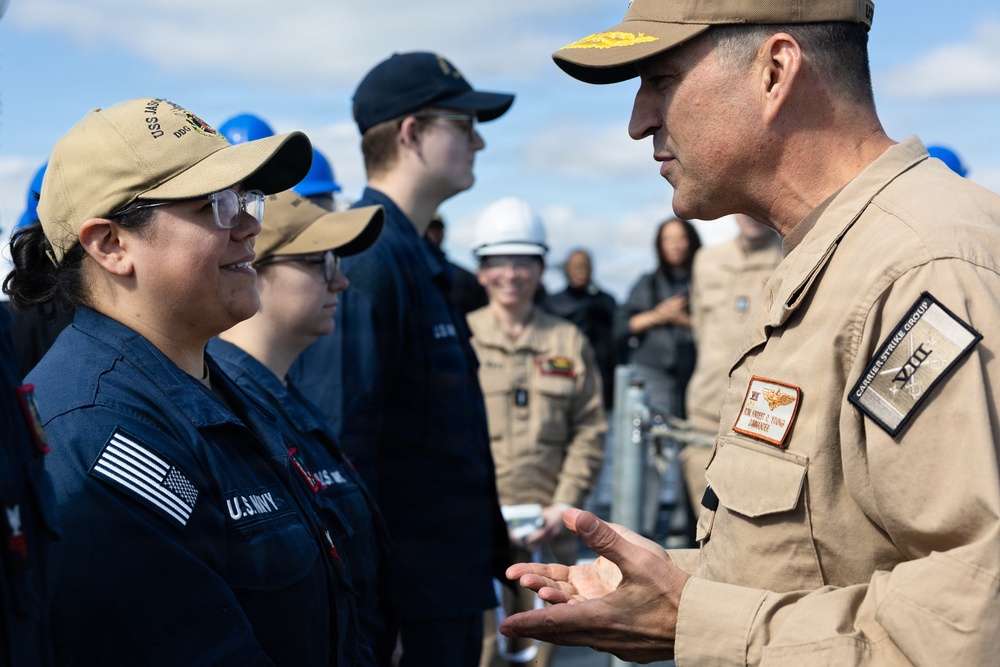 Rear Adm. Forrest Young, Commander, Carrier Strike Group (CSG) 8, Presents Awards to USS Jason Dunham (DDG 109)