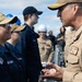 Rear Adm. Forrest Young, Commander, Carrier Strike Group (CSG) 8, Presents Awards to USS Jason Dunham (DDG 109)