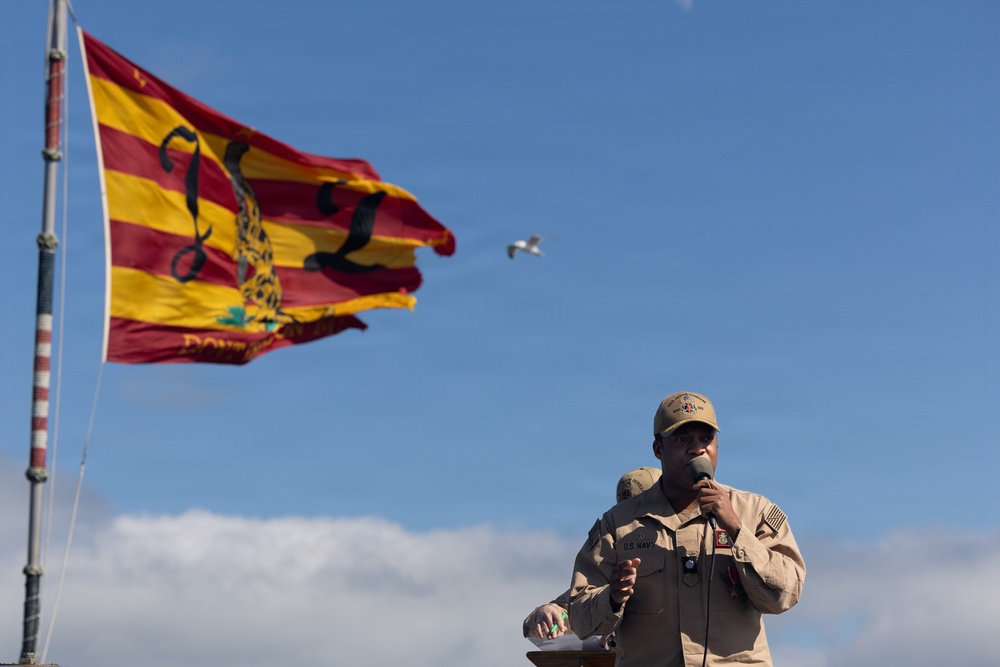Rear Adm. Forrest Young, Commander, Carrier Strike Group (CSG) 8, Presents Awards to USS Jason Dunham (DDG 109)