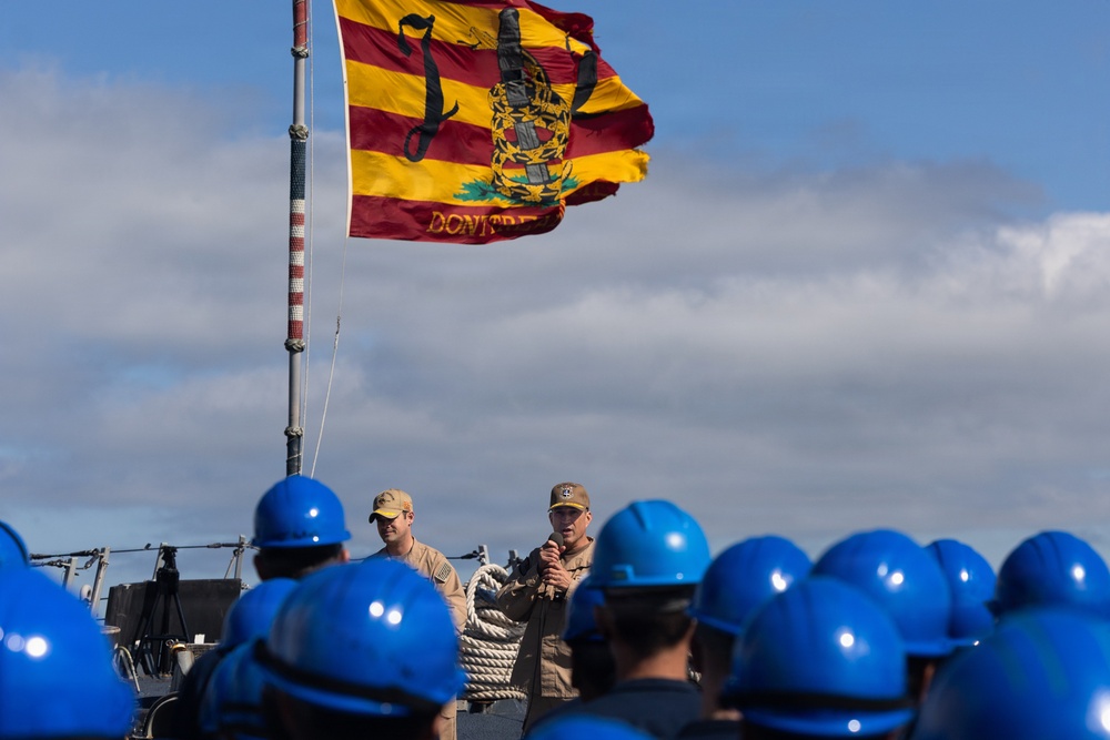 Rear Adm. Forrest Young, Commander, Carrier Strike Group (CSG) 8, Presents Awards to USS Jason Dunham (DDG 109)