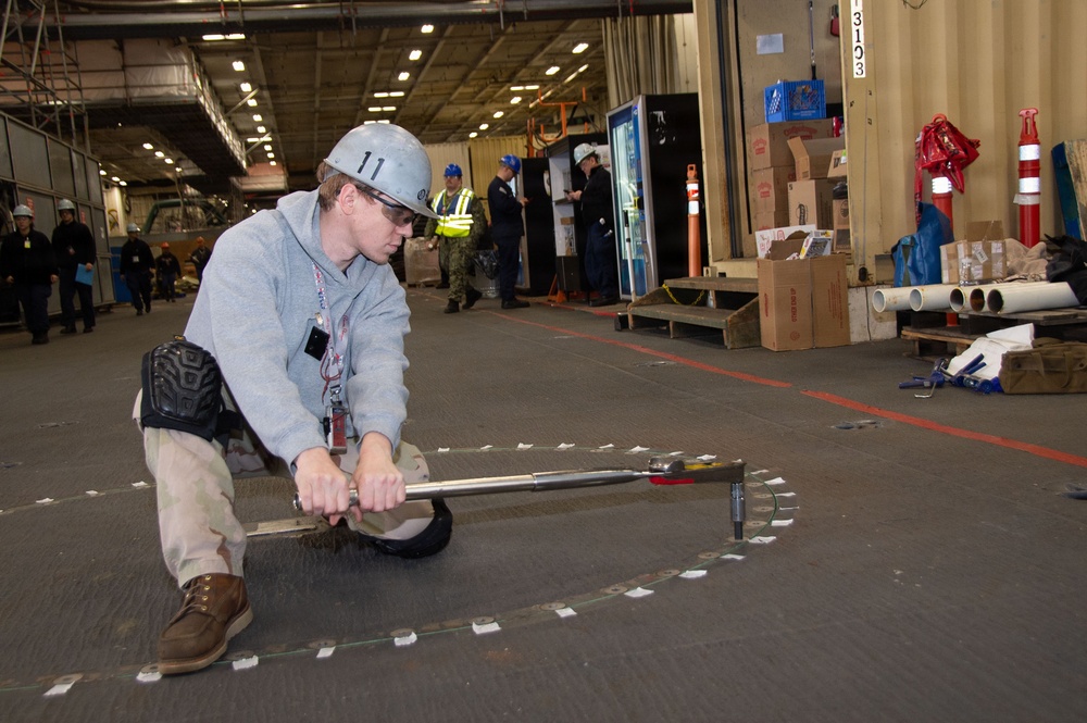 Ronald Reagan Sailors and Contractors Perform Maintenance