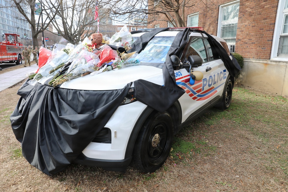 National Guard Soldiers stand alongside Metropolitan Police Department and community members to honor the life of Officer Terry Bennett