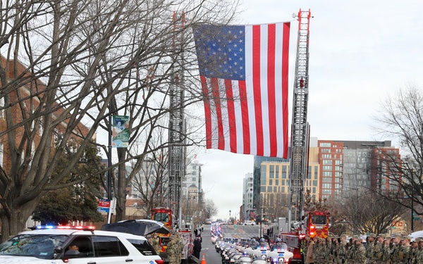 National Guard Soldiers stand alongside Metropolitan Police Department and community members to honor the life of Officer Terry Bennett