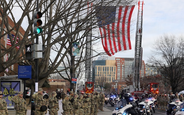 National Guard Soldiers stand alongside Metropolitan Police Department and community members to honor the life of Officer Terry Bennett