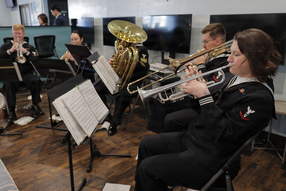 U.S. SEVENTH Fleet Band Performs at USO Grand Reopening