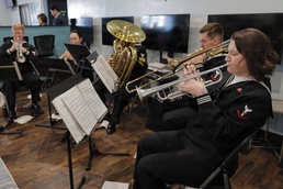 U.S. SEVENTH Fleet Band Performs at USO Grand Reopening