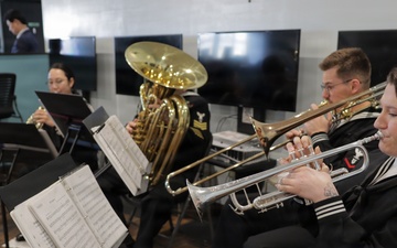 U.S. SEVENTH Fleet Band Performs at USO Grand Reopening