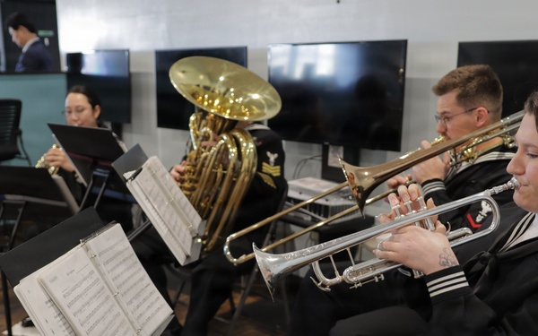 U.S. SEVENTH Fleet Band Performs at USO Grand Reopening