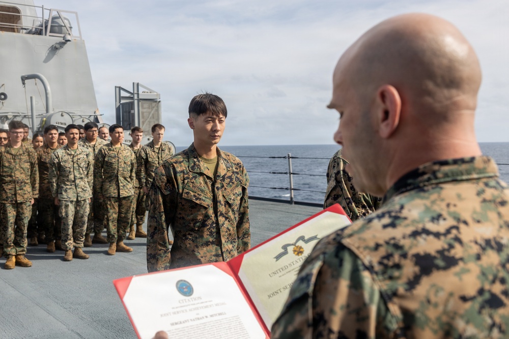 22nd MEU(SOC) | CLB 26 Awards Marine Aboard Fort Lauderdale