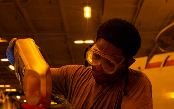 Abraham Lincoln conducts routine aircraft maintenance