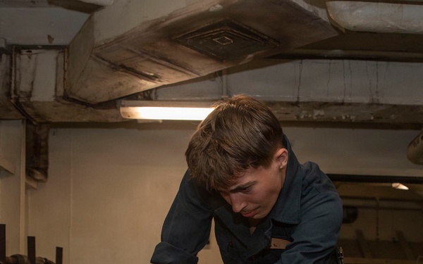 Abraham Lincoln conducts routine maintenance