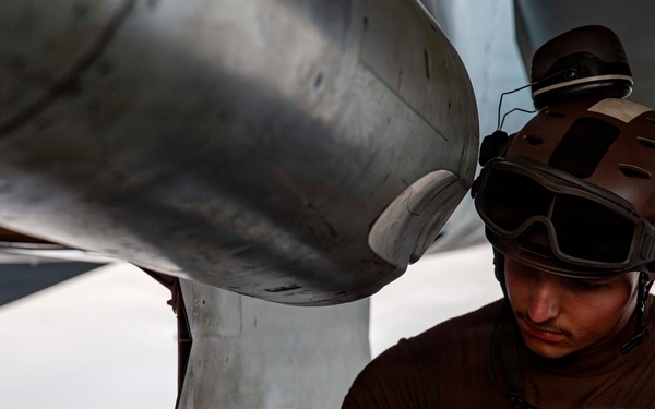 Abraham Lincoln conducts routine aircraft maintenance