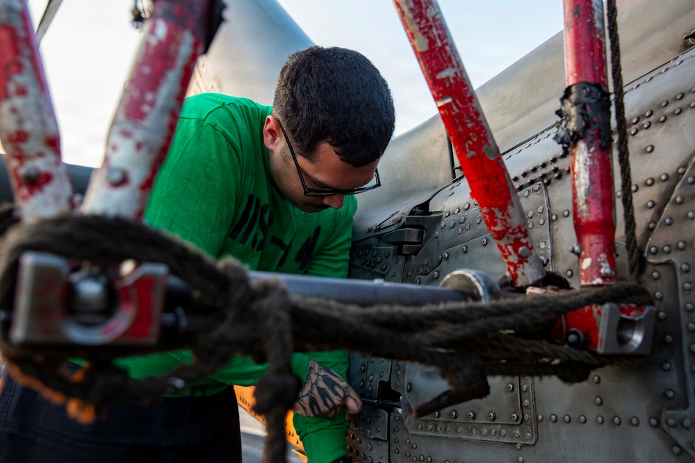 Abraham Lincoln conducts routine aircraft maintenance