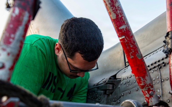 Abraham Lincoln conducts routine aircraft maintenance