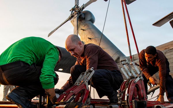 Abraham Lincoln conducts routine aircraft maintenance