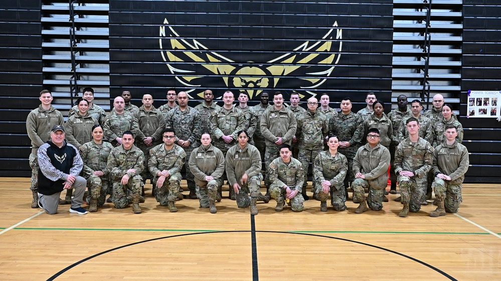 104th Fighter Wing volunteers with JROTC at Regional drill competition