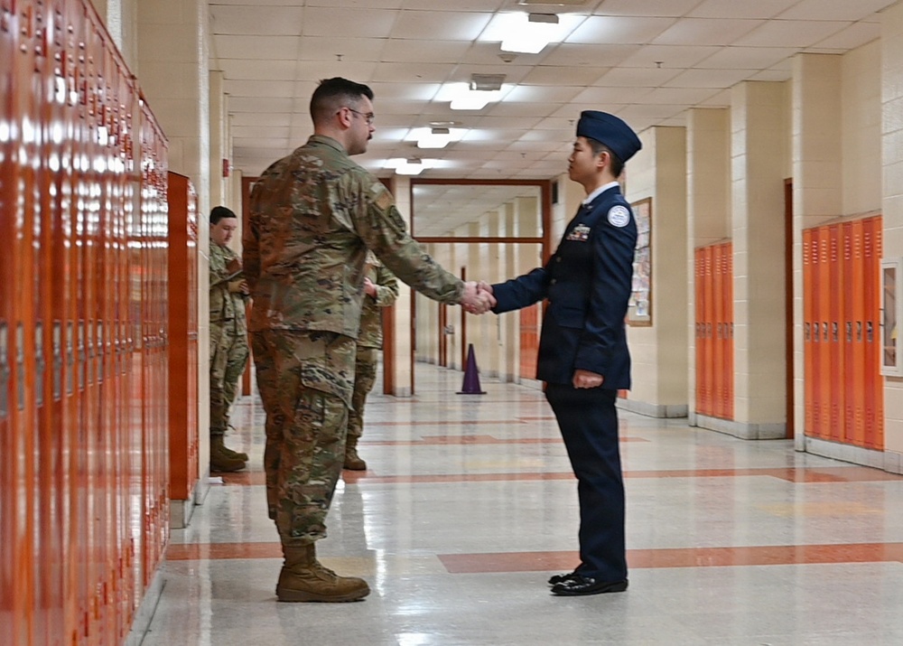 104th Fighter Wing volunteers with JROTC at Regional drill competition