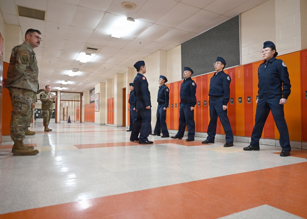 104th Fighter Wing volunteers with JROTC at Regional drill competition