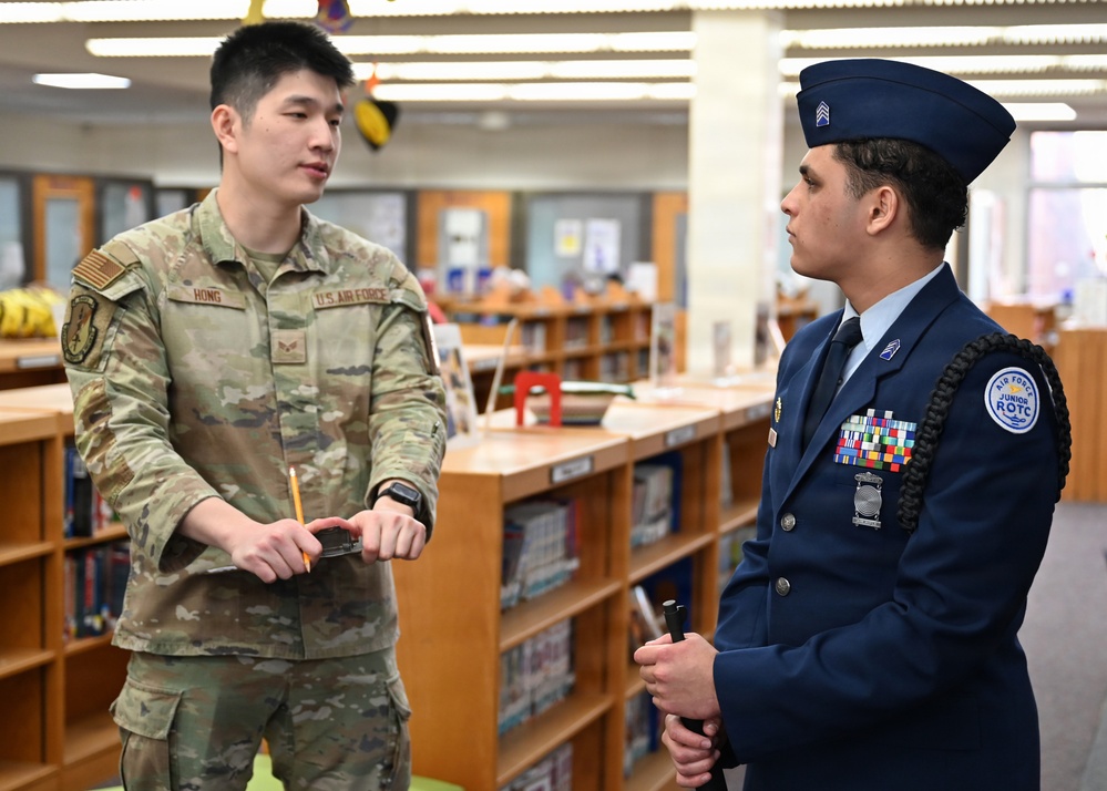 104th Fighter Wing volunteers with JROTC at Regional drill competition