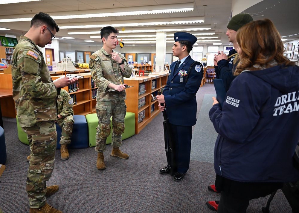 104th Fighter Wing volunteers with JROTC at Regional drill competition