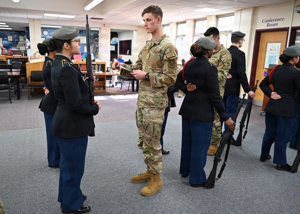 104th Fighter Wing volunteers with JROTC at Regional drill competition