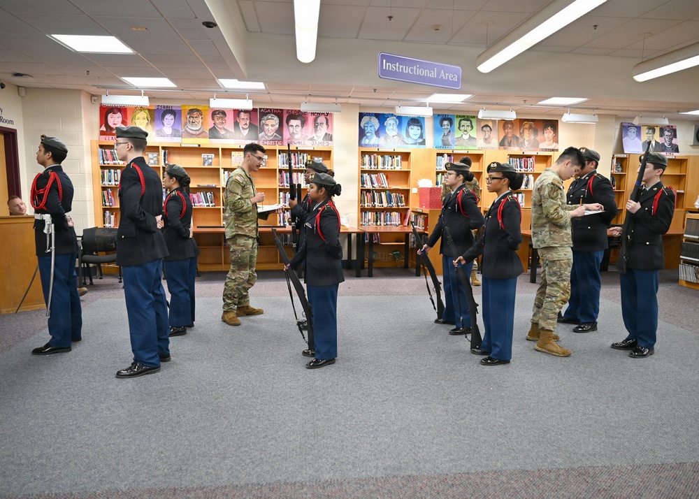 104th Fighter Wing volunteers with JROTC at Regional drill competition