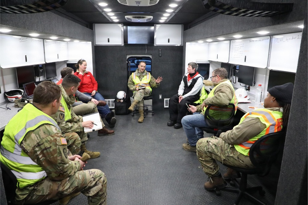 Vicksburg District Commander COL Jeremiah Gipson briefing members of the Emergency Power Team