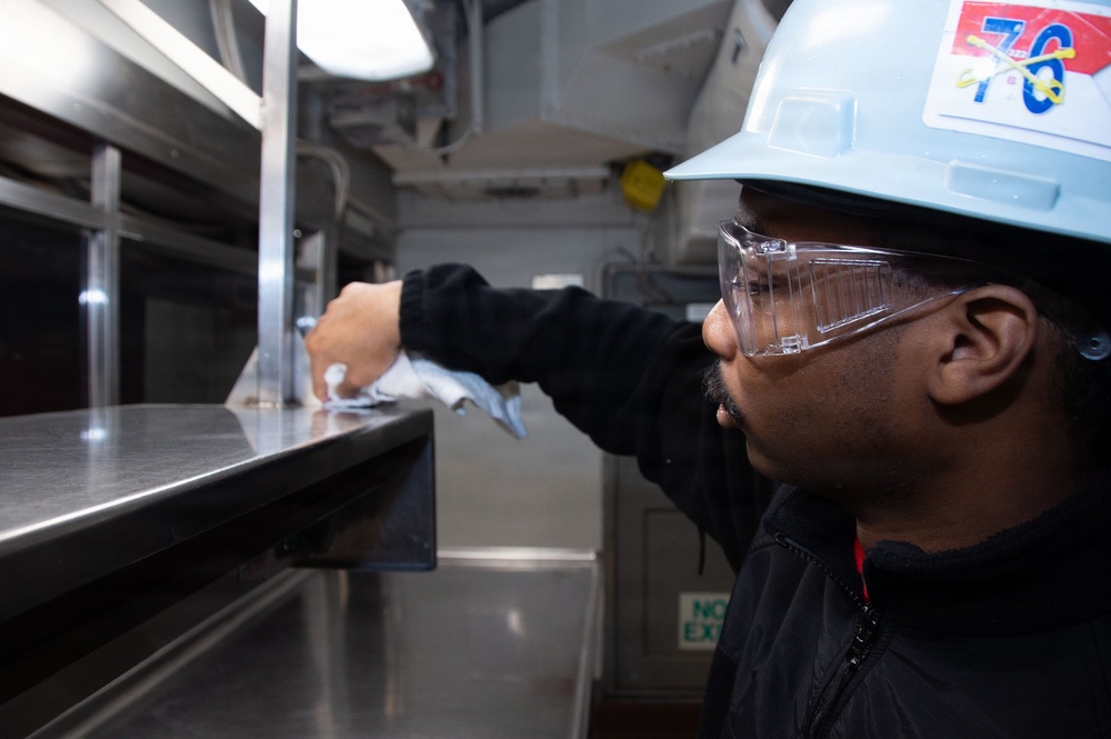 Ronald Reagan Sailors and Contractors Perform Daily Operations