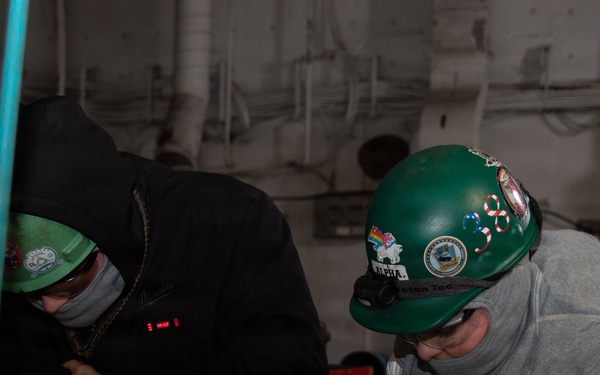 Ronald Reagan Sailors and Contractors Perform Maintenance