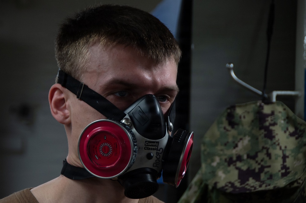 Ronald Reagan Sailors and Contractors Perform Maintenance