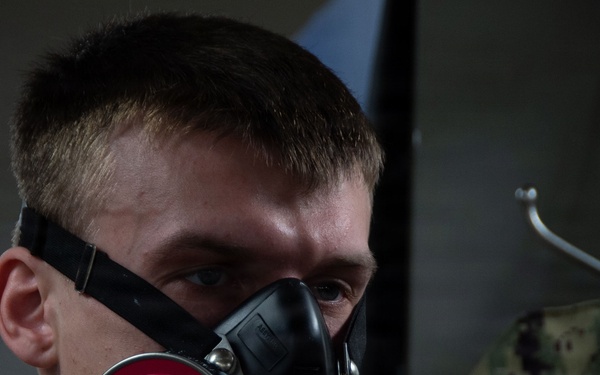 Ronald Reagan Sailors and Contractors Perform Maintenance