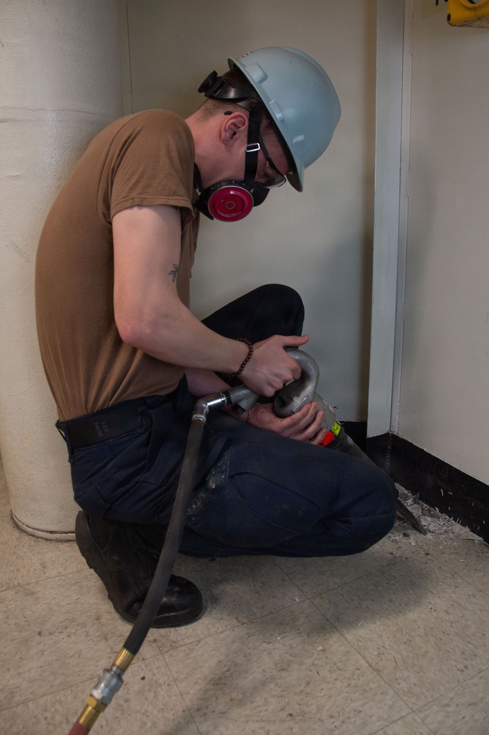 Ronald Reagan Sailors and Contractors Perform Maintenance