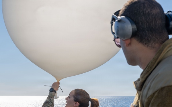 Airmen Assigned to the 45th Weather Squadron Launch Weather Balloons At Sea
