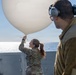 Airmen Assigned to the 45th Weather Squadron Launch Weather Balloons At Sea