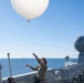 Airmen Assigned to the 45th Weather Squadron Launch Weather Balloons At Sea