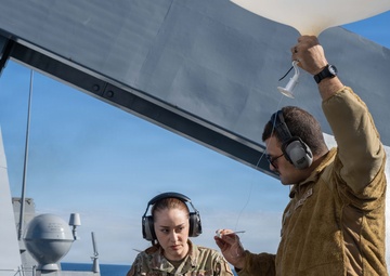 Airmen Assigned to the 45th Weather Squadron Launch Weather Balloons At Sea