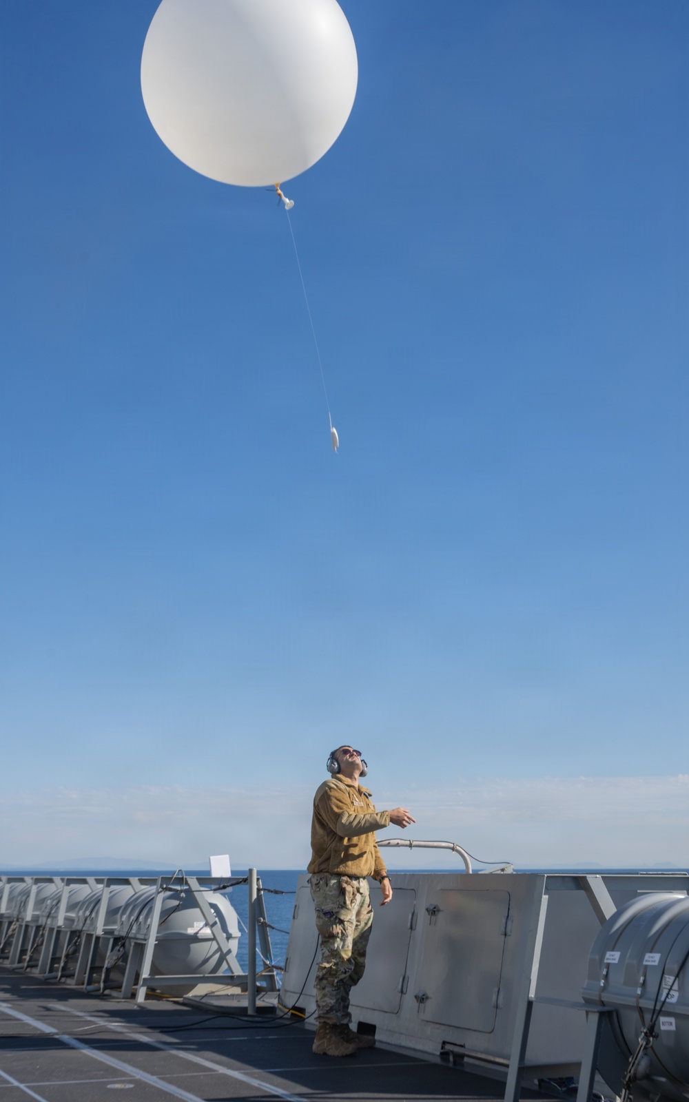 Airmen Assigned to the 45th Weather Squadron Launch Weather Balloons At Sea