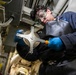 USS Mitscher (DDG 57) Sailor takes fuel sample