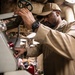 USS Mitscher (DDG 57) Chief inspects air pressure in engine room