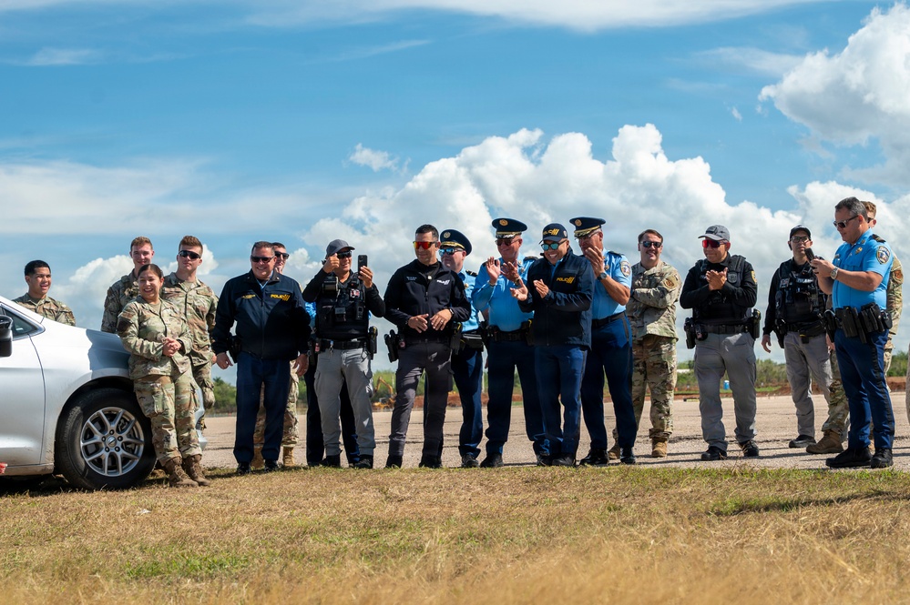 Local police in Aguadilla Puerto Rico visit with 346th EABS defenders