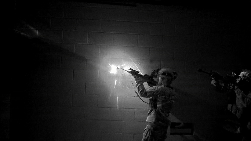 Paratroopers assigned to 3rd Brigade Combat Team, 82nd Airborne Division assault an objective after a joint forcible entry during Panther Avalanche at Fort Bragg, North Carolina, Jan. 28, 2026.