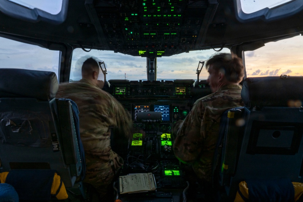 The 14th Airlift Squadron conducts a nighttime dissimular formation flight during Exercise Palmetto Reach
