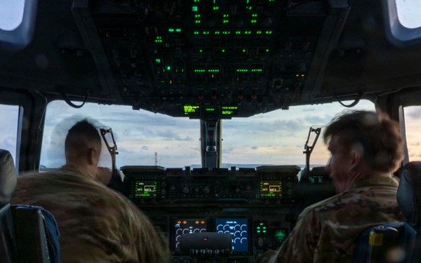 The 14th Airlift Squadron conducts a nighttime dissimular formation flight during Exercise Palmetto Reach