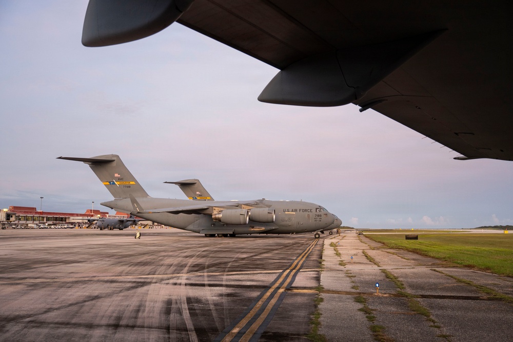The 14th Airlift Squadron conducts a nighttime dissimular formation flight during Exercise Palmetto Reach