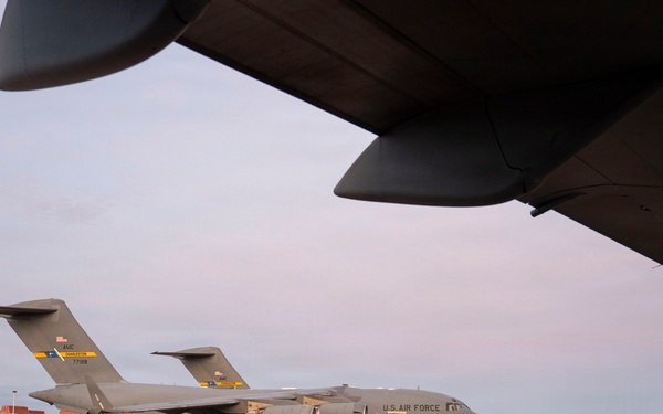 The 14th Airlift Squadron conducts a nighttime dissimular formation flight during Exercise Palmetto Reach