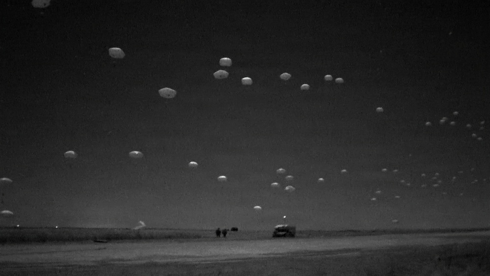Paratroopers assigned to 3rd Brigade Combat Team, 82nd Airborne Division assault an objective after a joint forcible entry during Panther Avalanche at Fort Bragg, North Carolina, Jan. 28, 2026.